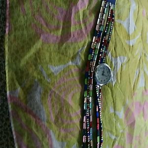 Wrapped around watch with crystals on it